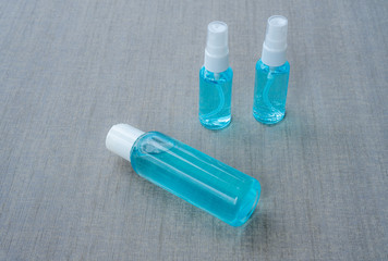 Surgical mask and Hand sanitizer gel for hand hygiene COVID-19 virus protection. Copy space and background. Covid-19 pandemic protection equipment. Safety and hygiene for protect virus concept.