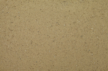 Fototapeta na wymiar Beach sand texture. Overhead shot. Real plain beach sand surface wallpaper
