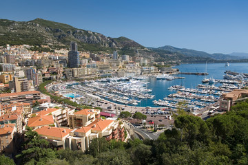 Fototapeta na wymiar Elevated view of Monte-Carlo and harbor in the Principality of Monaco, Western Europe on the Mediterranean Sea