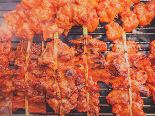 Roast or Grilled Chicken Thai Style, Barbecue Chicken. Focus selective.