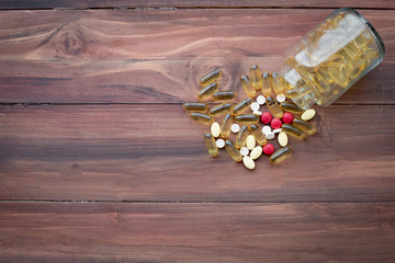 Medicine concept on wood background.