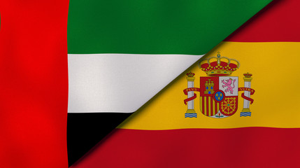 The flags of United Arab Emirates and Spain. News, reportage, business background. 3d illustration
