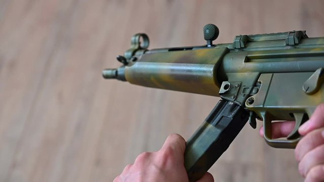 Use Of The Loading Lever Of A Submachine Gun Slow Motion