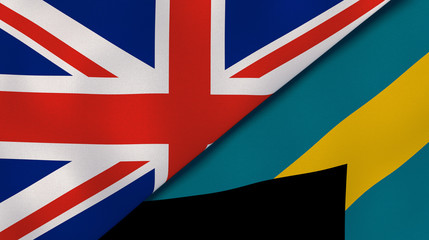 The flags of United Kingdom and Bahamas. News, reportage, business background. 3d illustration