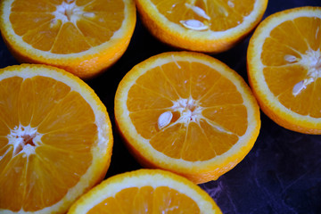 Orange Juice, Vitamin C Boost, Freshly hand juiced fruit juice. Half cut oranges. Healthy lifestyle