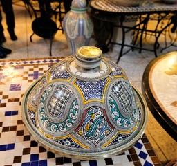 TRaditional beautiful tagine with metal ornaments.