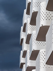 New modern home. Balconies on the facade of the building create a beautiful pattern. Strong...