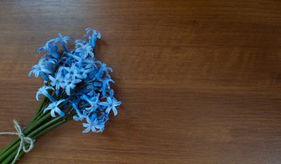 Bouquet hyacinth on wooden background