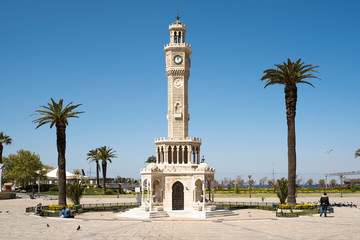 Fototapeta na wymiar Clock tower of Izmir Turkey. Empty streets because of Coronavirus pandemi. People of is izmir is staying home.
