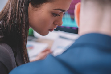 Selective focus of data analysts working in office
