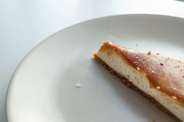 Cheesecake with salted caramel sauce on plate