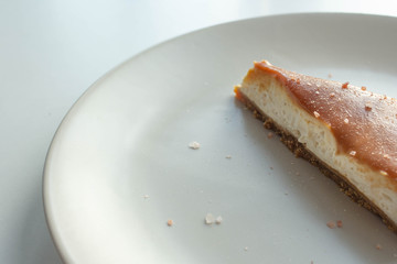 Cheesecake with salted caramel sauce on plate