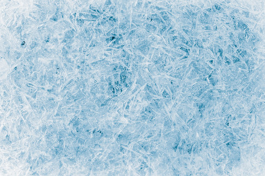 Abstract blue ice frost natural background with hoarfrost crystals.