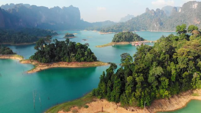Scenic Mountains And Islands On The Beautiful Lake In Khao Sok National Park, Thailand. - aerial drone shot