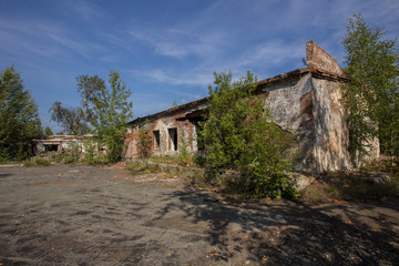 Ruins of abandoned mining buidings in forest