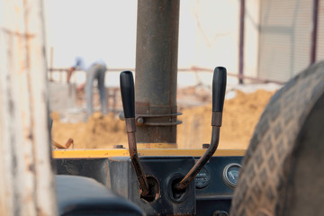 The track of bulldozer on the sand.