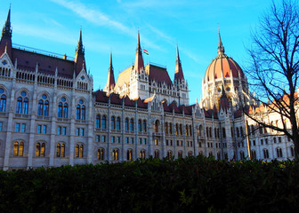 Fototapeta na wymiar View of the Hungarian Parliament Building (Orszaghaz) in Budapest, Hungary. It is the seat of the National Assembly of Hungary and a popular tourist destination in Budapest.