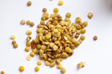 Lentil seeds are flat on white background