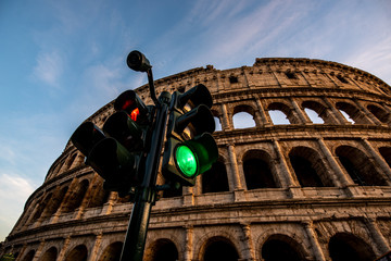 Road Traffic Light near Ancient Coliseum in Rome, Italy