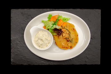 pumpkin pancakes on a white plate