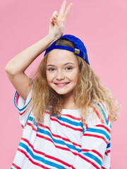 little girl wearing a hat