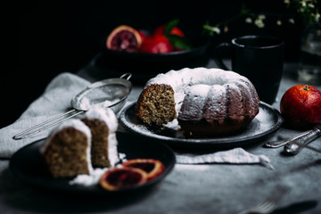 cake with red orange on a dark background