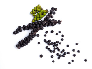 Top view of spices and herbs with fresh peppercorn seed isolated on white background.