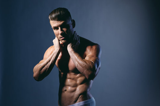 handsome muscular man posing