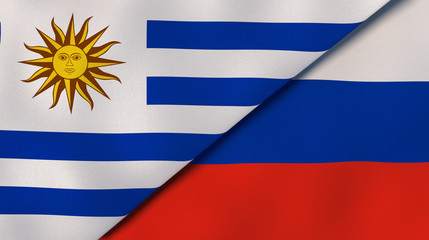 Obraz premium The flags of Uruguay and Russia. News, reportage, business background. 3d illustration