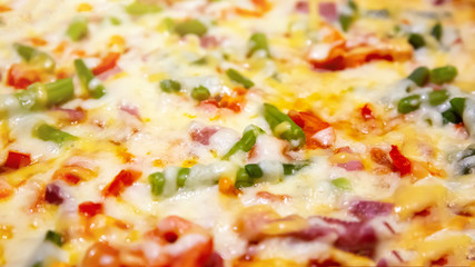 Close up pizza with vegetables, ham and cheese. Best Italian cuisine. Favourite food. Cooking during quarantine time.