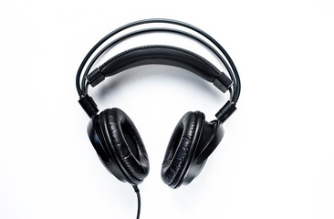 black professional closed-view headphones on a white background