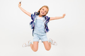 happy european girl jumping on a white background