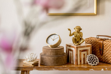 Modern composition of stylish accessories, decoration, flowers on the wooden bench at white living...