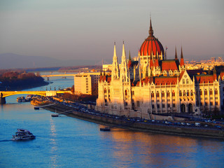 Fototapeta na wymiar View of the Hungarian Parliament Building and the Danube river at sunset in Budapest, Hungary.