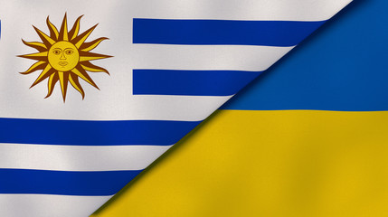 The flags of Uruguay and Ukraine. News, reportage, business background. 3d illustration