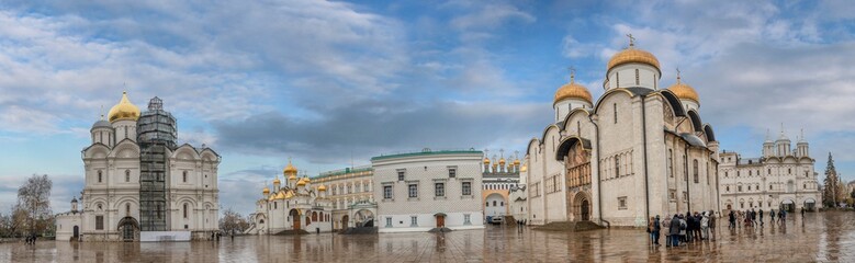 Fototapeta na wymiar Panorama of Cathedral square Kremlin, Moscow, Russia. Assumption Cathedral, the Church of Twelve Apostles, Faceted Chamber, Annunciation Cathedral and Ivan the Great Bell Tower