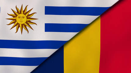 The flags of Uruguay and Chad. News, reportage, business background. 3d illustration