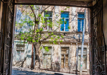 treet of the Old town Tbilisi. Some of  building look poor. Georgia