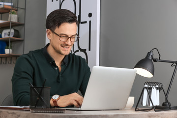 Handsome businessman working in office