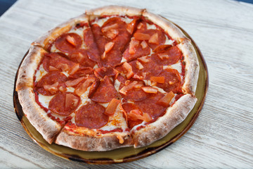 pizza with tomato and cheese