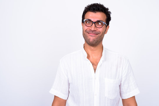 Portrait of funny Turkish man with eyeglasses making face