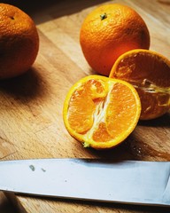 orange on wooden table