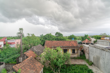 Aerial view stormy weather approaching a small village in the North Vietnam