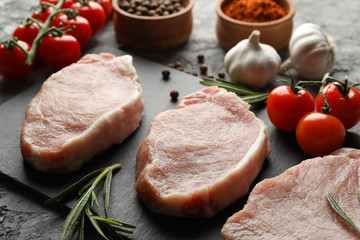 Composition with raw meat and ingredients. Cooking steak concept