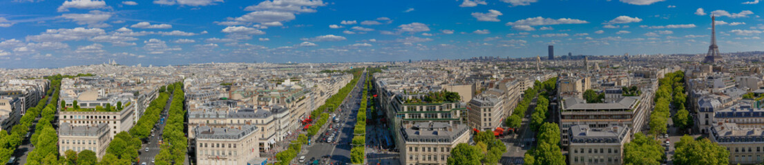 PARIS, FRANCE, EUROPE -Panoramic Aerial view of Paris, France as seen from the Arch of Triumph on a sunny day with white puffy clouds, shot August 4, 2015