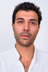 Obraz premium Face of handsome Turkish man looking at camera