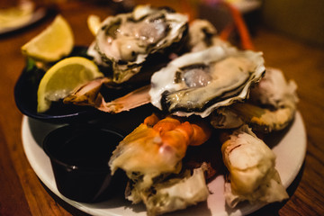 Luxury seafood buffet plate with oyster and crab