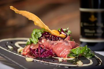 Beef Carpaccio with arugula & parmigiano reggiano