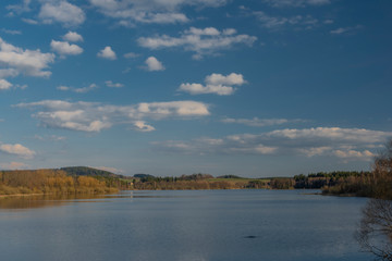 End of Lipno dam with dry grass in dry spring sunny day