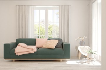 White living room with sofa and summer landscape in window. Scandinavian interior design. 3D illustration